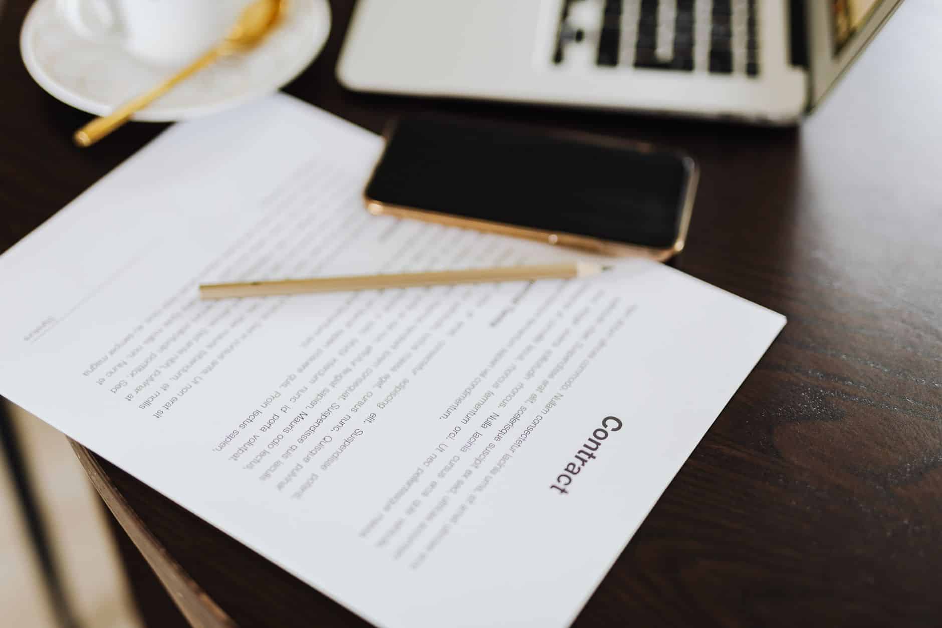 Client reviewing an online proposal with an e-signature field on a laptop